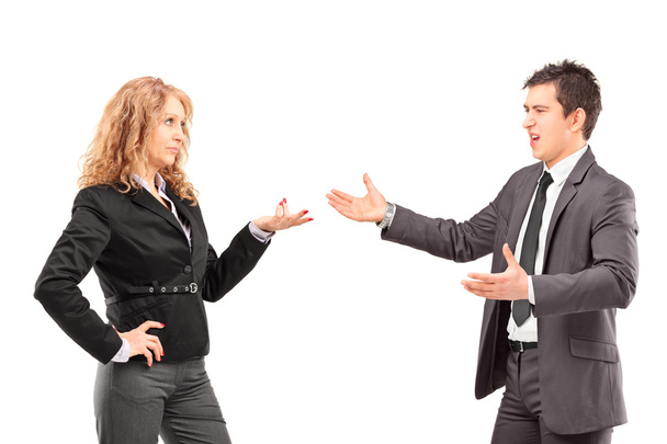 Businesswoman having argument with businessman - Foto, afbeelding