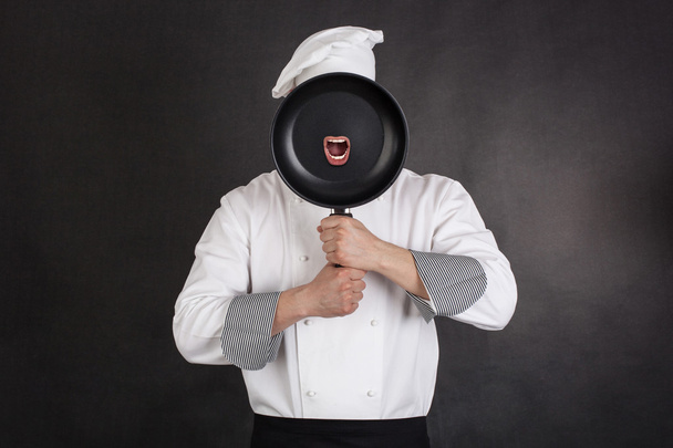 Chef behind pan - Foto, Imagen