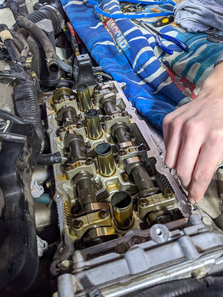 Machanic repairman at automobile car engine repair - Photo, Image