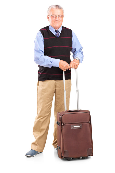 Senior gentleman with travel bag - Foto, imagen