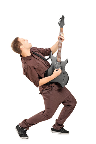 Rock star playing guitar - Foto, immagini