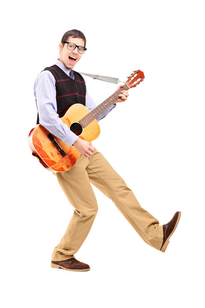 Happy male playing guitar - Fotó, kép