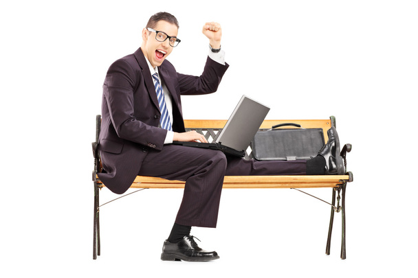 Businessman with laptop - Photo, image