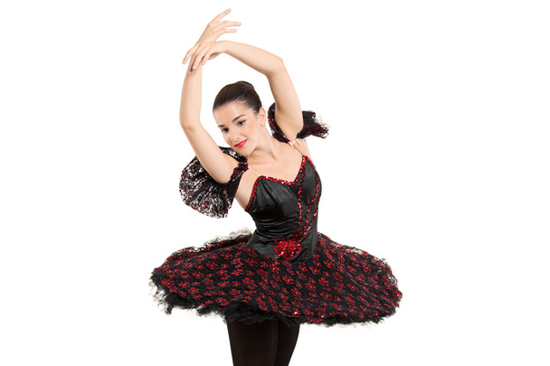 A ballerina dancer making a ballet posing - Foto, immagini