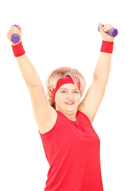 Lady working out with dumbbells - Photo, image
