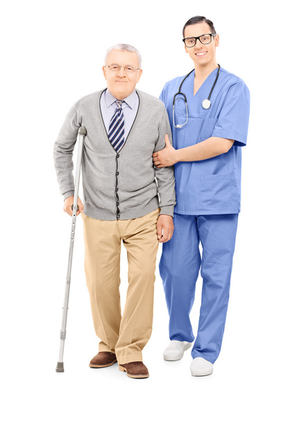 Doctor helping an elderly gentleman - Zdjęcie, obraz