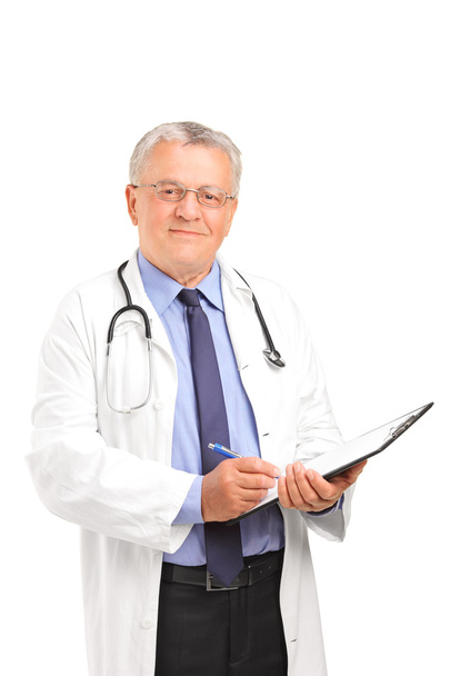 Healthcare professional holding clipboard - 写真・画像