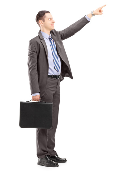 Businessman pointing in direction - Φωτογραφία, εικόνα