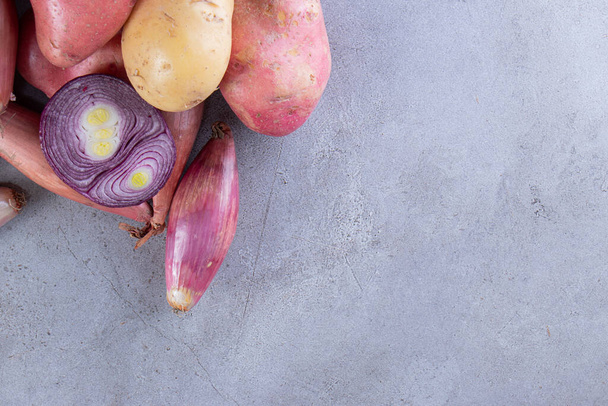 fresh organic vegetables on a gray background  - Фото, изображение