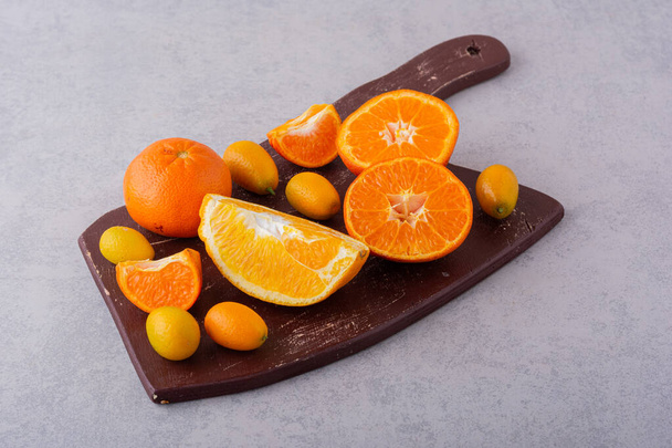 Friss citrusfélék háttere. Egészséges táplálkozás koncepciója  - Fotó, kép