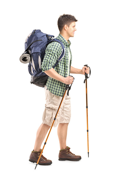 Hiker with hiking poles walking - Foto, Imagen