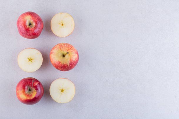 fresh ripe apples on a grey background. - Photo, Image