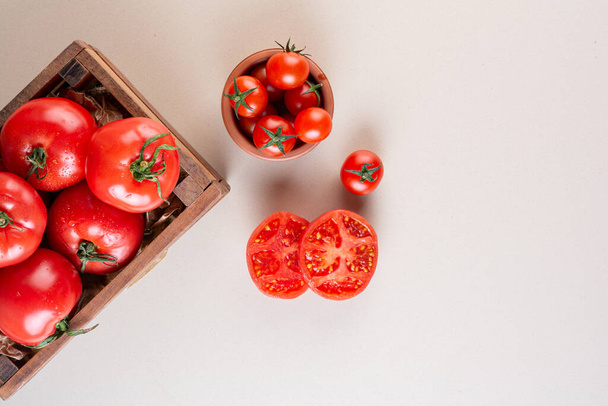 fresh tomatoes on kitchen table background - Photo, Image