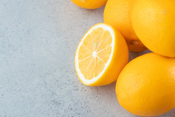 fresh lemon fruits on kitchen table. free space for text. - Foto, Bild