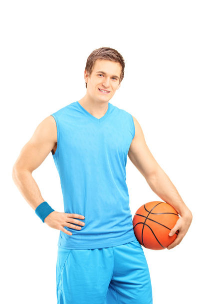 Basketball player holding ball - Fotoğraf, Görsel
