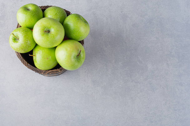 fresh green apples on a kitchen table  - Photo, Image