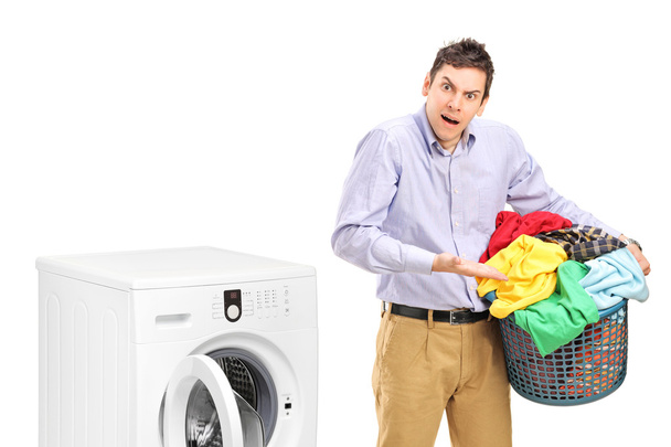 Man holding laundry basket - Foto, immagini