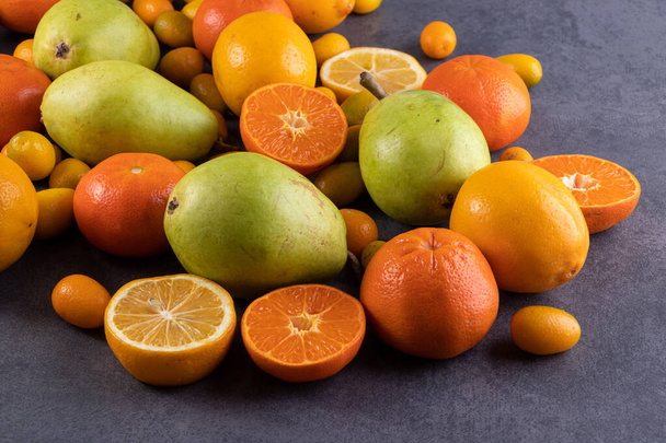 fresh fruits on grey  background - Photo, Image