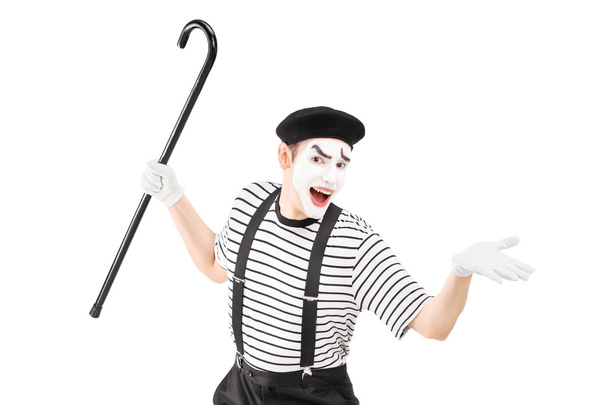 Mime artist holding a cane - Photo, image