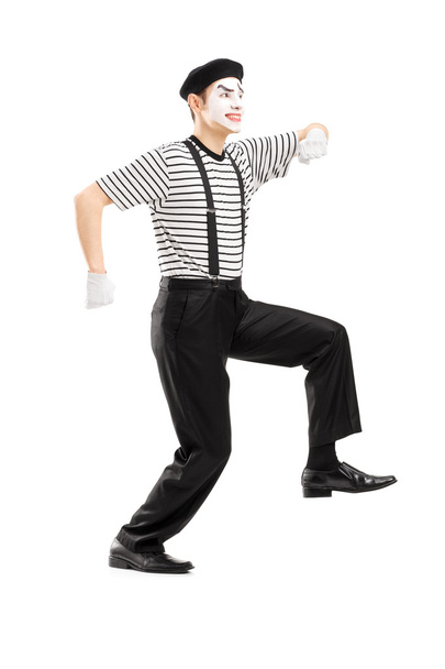 Mime artist simulate walking on rop - Photo, image