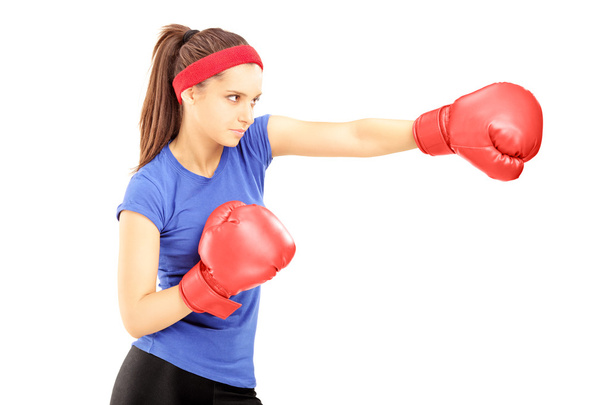 Female athlete with boxing gloves - Фото, изображение