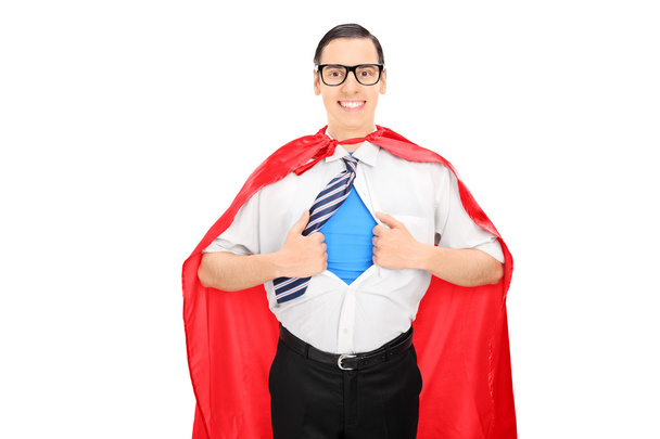 mannelijke superheld scheuren zijn overhemd - Foto, afbeelding