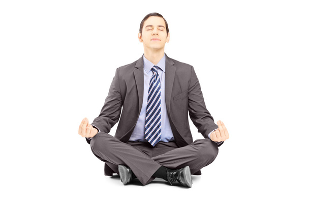 Businessman meditating - Fotó, kép