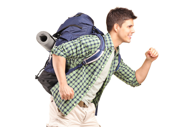 Hiker with backpack running - Foto, imagen