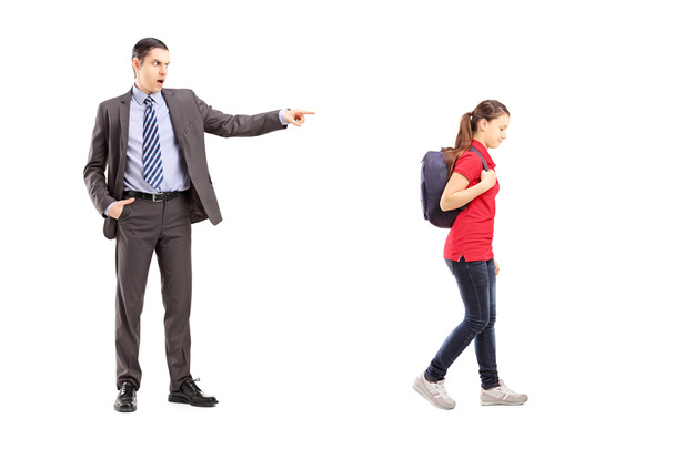 Angry father yelling at daughter - 写真・画像