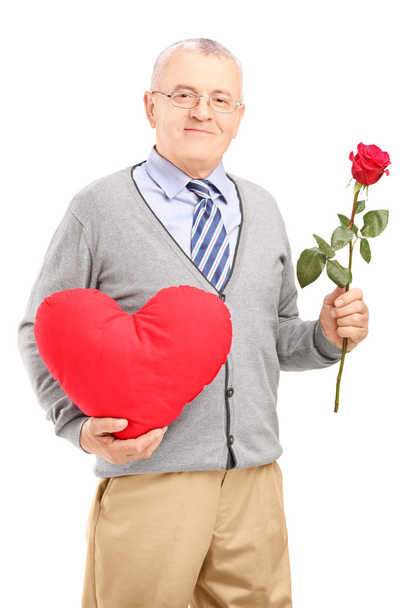 Gentleman holding red heart - Foto, imagen