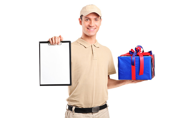 Delivery person delivering gift box - Photo, image