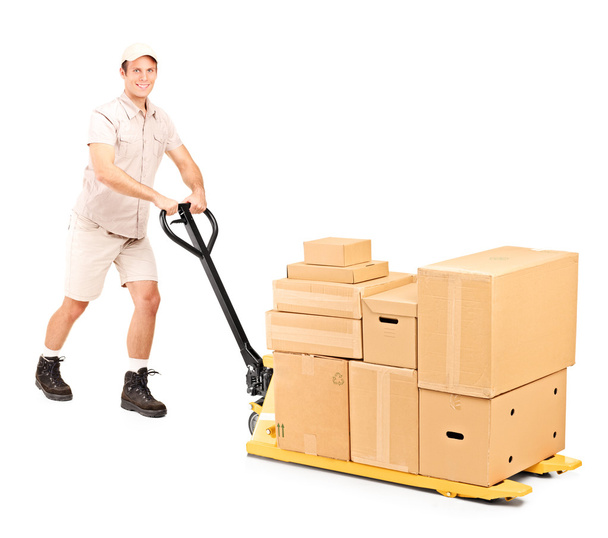 Worker pushing fork pallet truck - Photo, Image