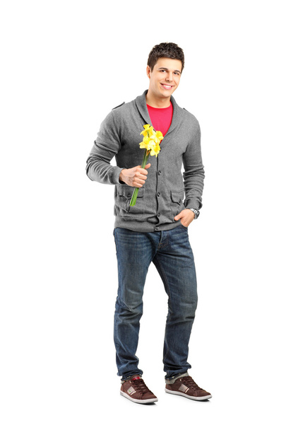 Male holding flowers - Foto, afbeelding