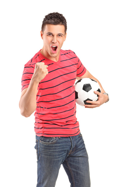 Man cheering and holding football - Φωτογραφία, εικόνα