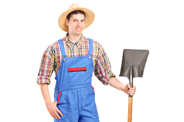Agricultural worker holding shovel - Foto, Imagem