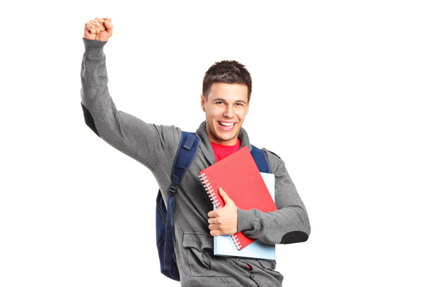 Student holding books - Foto, afbeelding