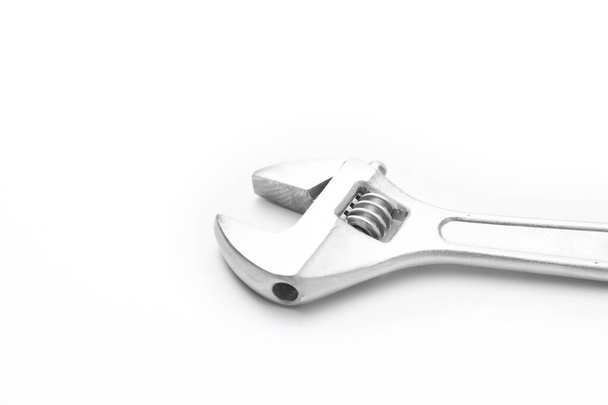 Регульований гайковий ключ ізольовано на білому тлі
 - Фото, зображення