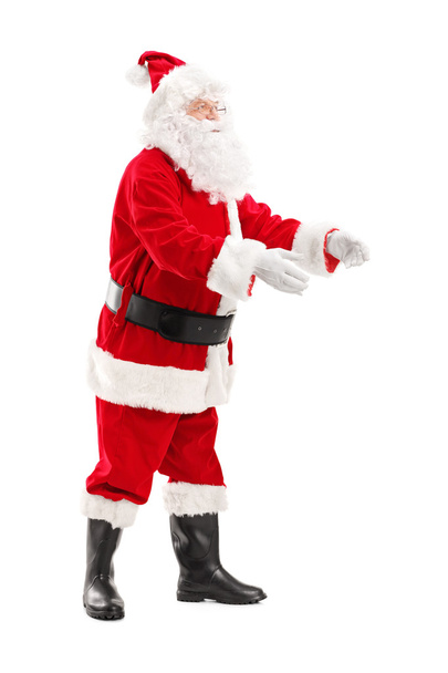 Santa Claus about to take something - Foto, Imagem