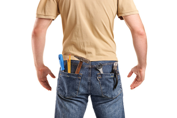 Male worker with tools in back pocket - Fotoğraf, Görsel