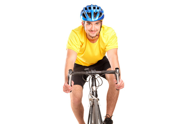 Bicyclist with yellow shirt - 写真・画像
