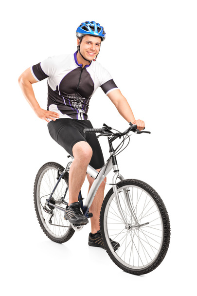 Male biker posing on bike - 写真・画像