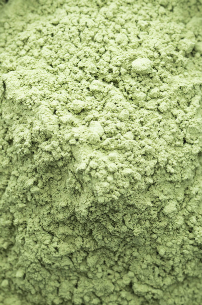 close-up image of green matcha powder on stone - Zdjęcie, obraz