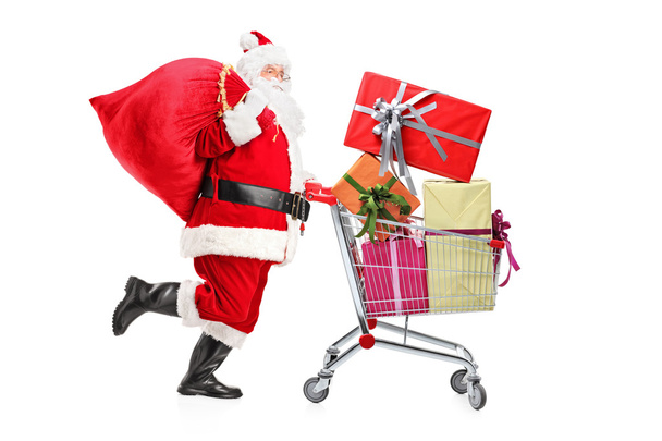Santa Claus pushing shopping cart - Foto, Imagem