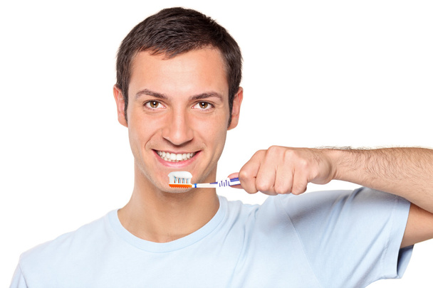 Man brushing his teeth - Photo, Image