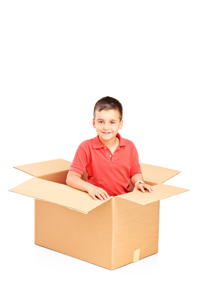 Child in cardbox - Foto, Imagen