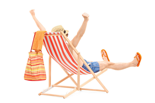 Hombre en silla de playa
 - Foto, Imagen