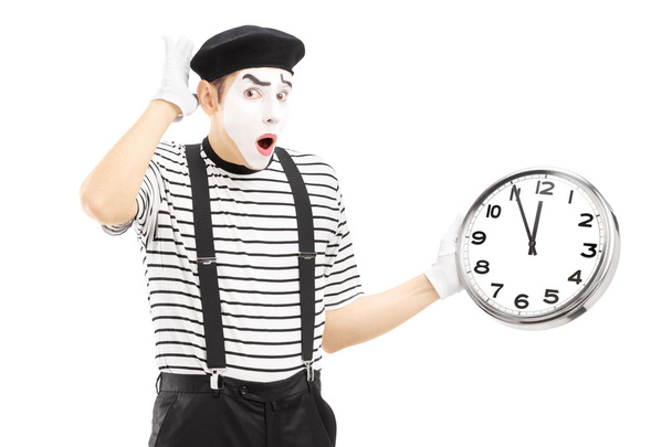 Mime holding clock and gesturing late - Φωτογραφία, εικόνα