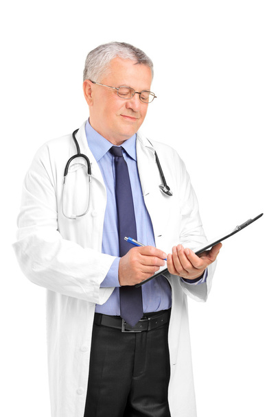 Healthcare professional writing down notes - Foto, Imagen