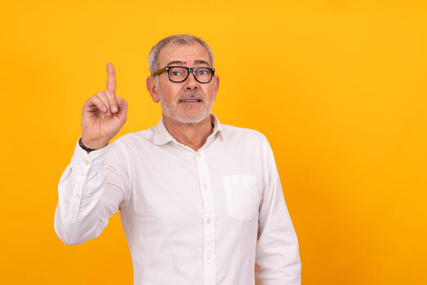 isolated adult man with raised finger - Photo, Image