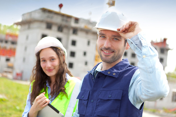 Portrait of co-workers on a construction site - Zdjęcie, obraz